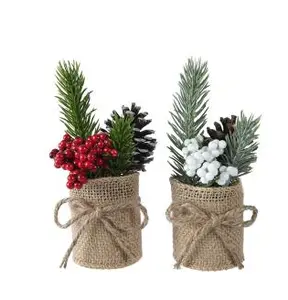 Pine spray in jute pot with white or red berries